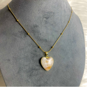 Heart shaped milky quartz stone